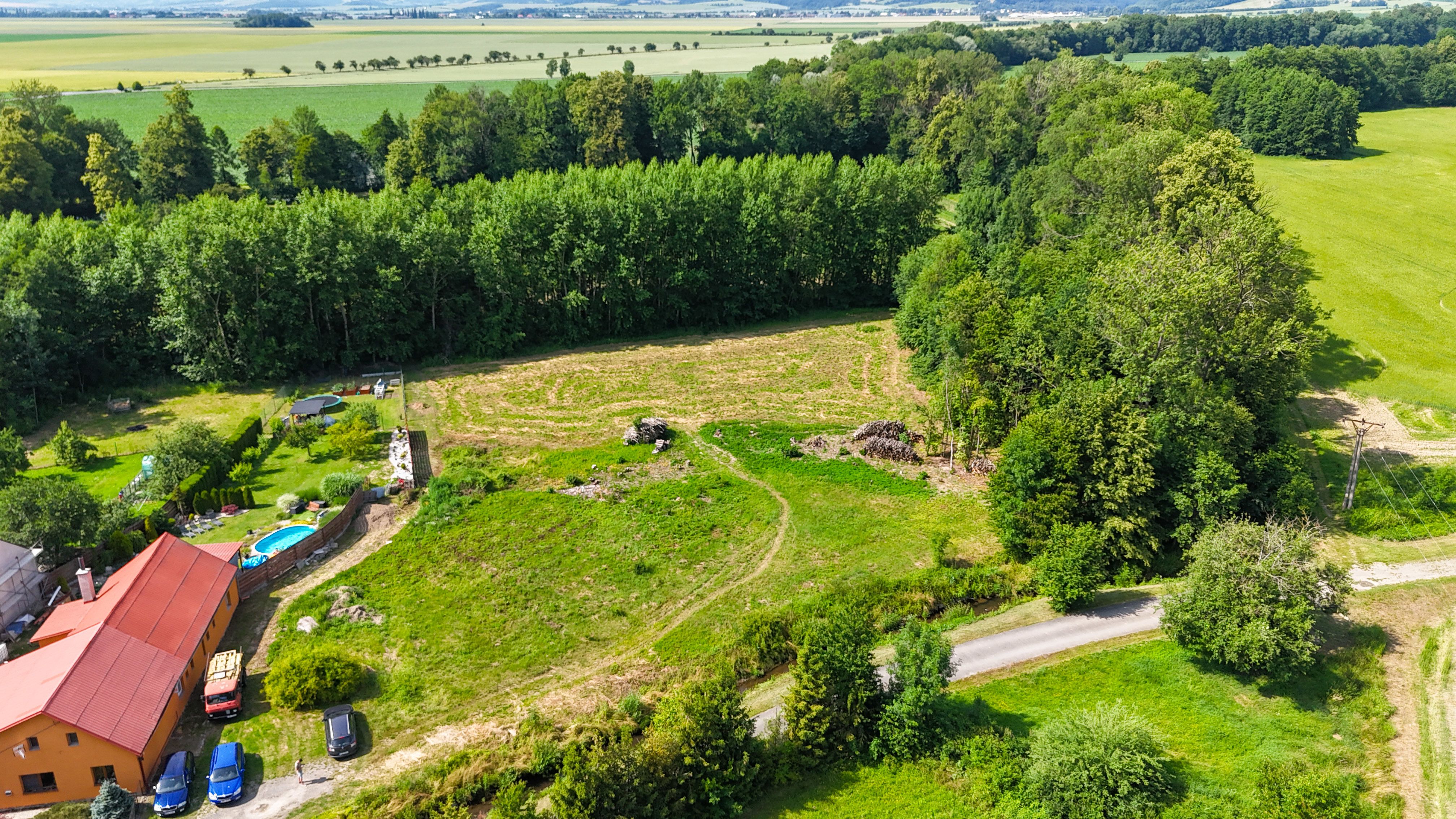 Stavební pozemek 6794 m² – Haukovice u Uničova - titulní obrázek